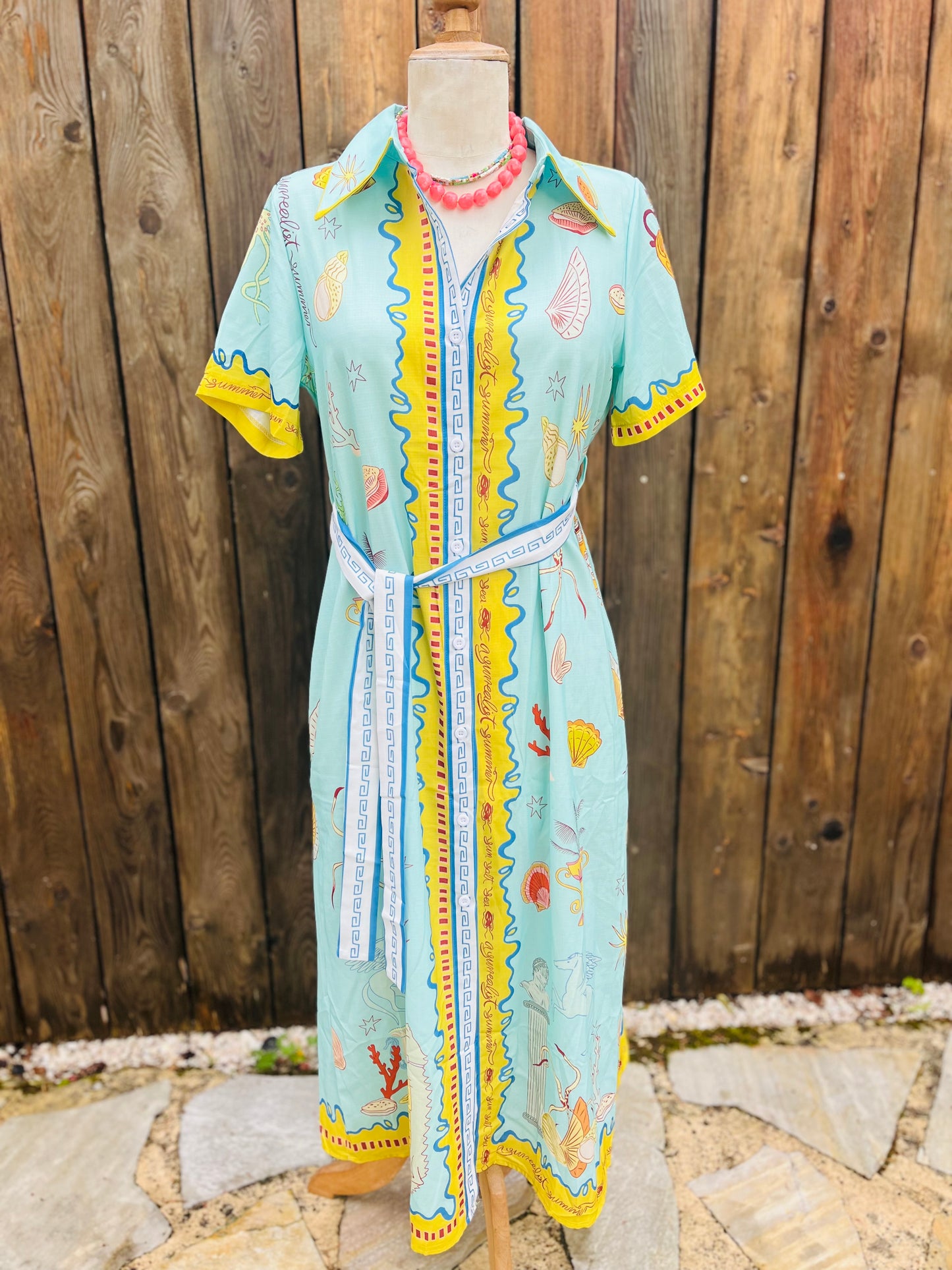 Robe longue verte et dessins coquillages